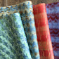 four sheets of wrapping paper with paste paper designs by Elizabeth Harbour at the Danby Press