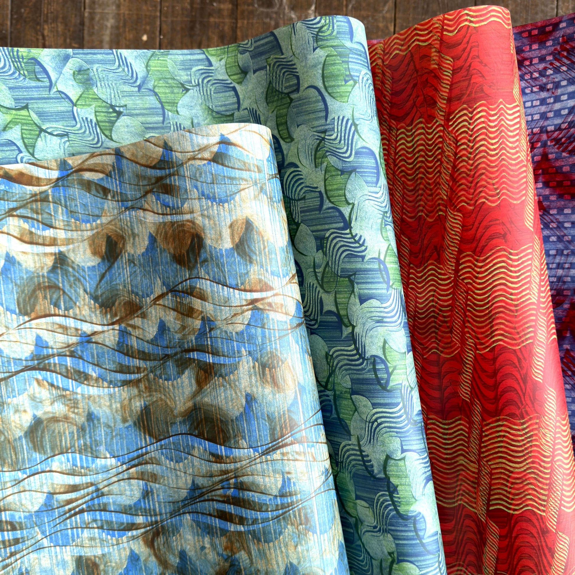 4 sheets of wrapping paper with paste paper designs