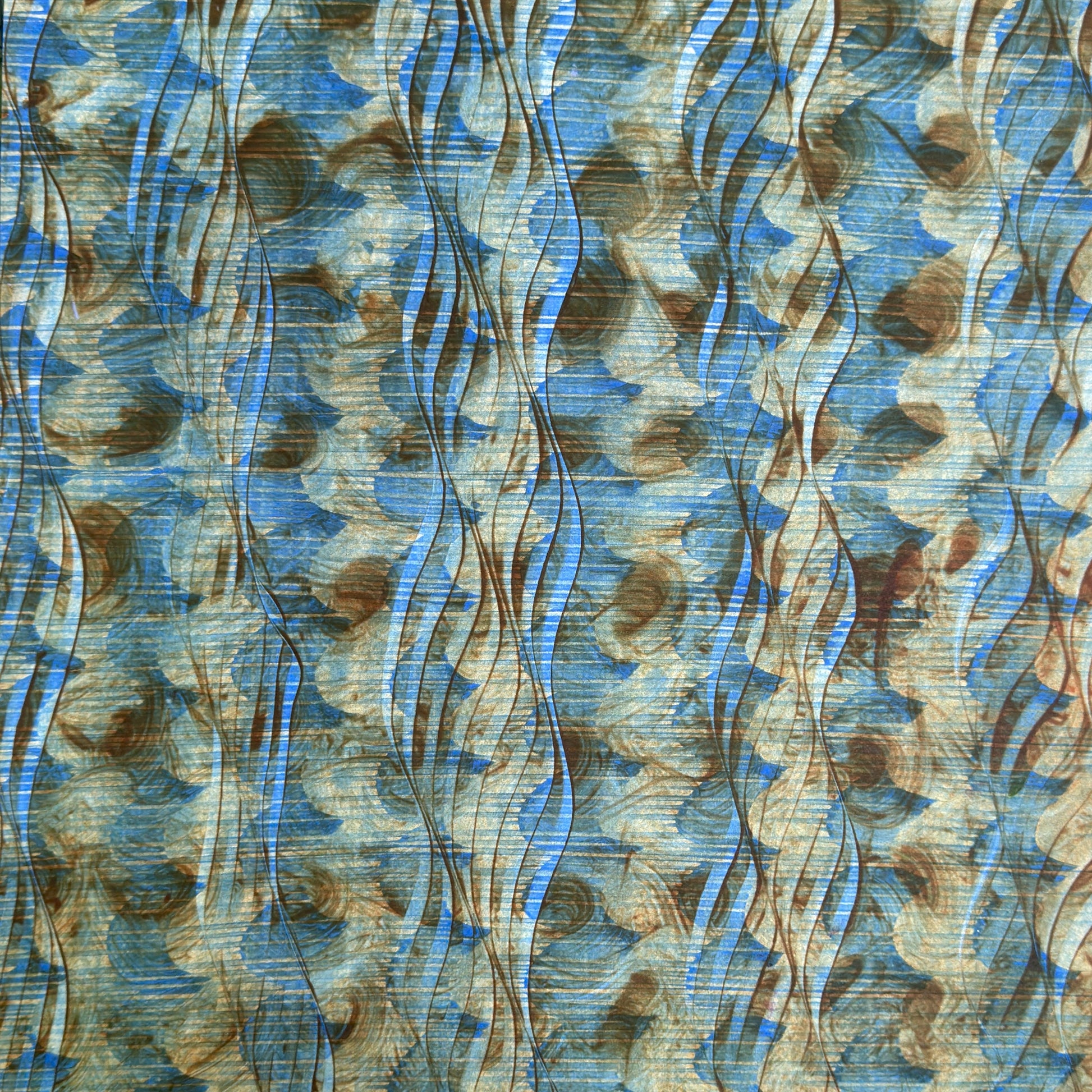 a sheet of wrapping paper with a paste paper style design in blue and brown