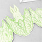 a cut-out and stand-up greetings card of a rabbit in a lettuce, by Elizabeth Harbour