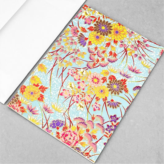 japanese silk-screen printed greetings card with bright floral pattern on a pale blue backdrop by Esmie