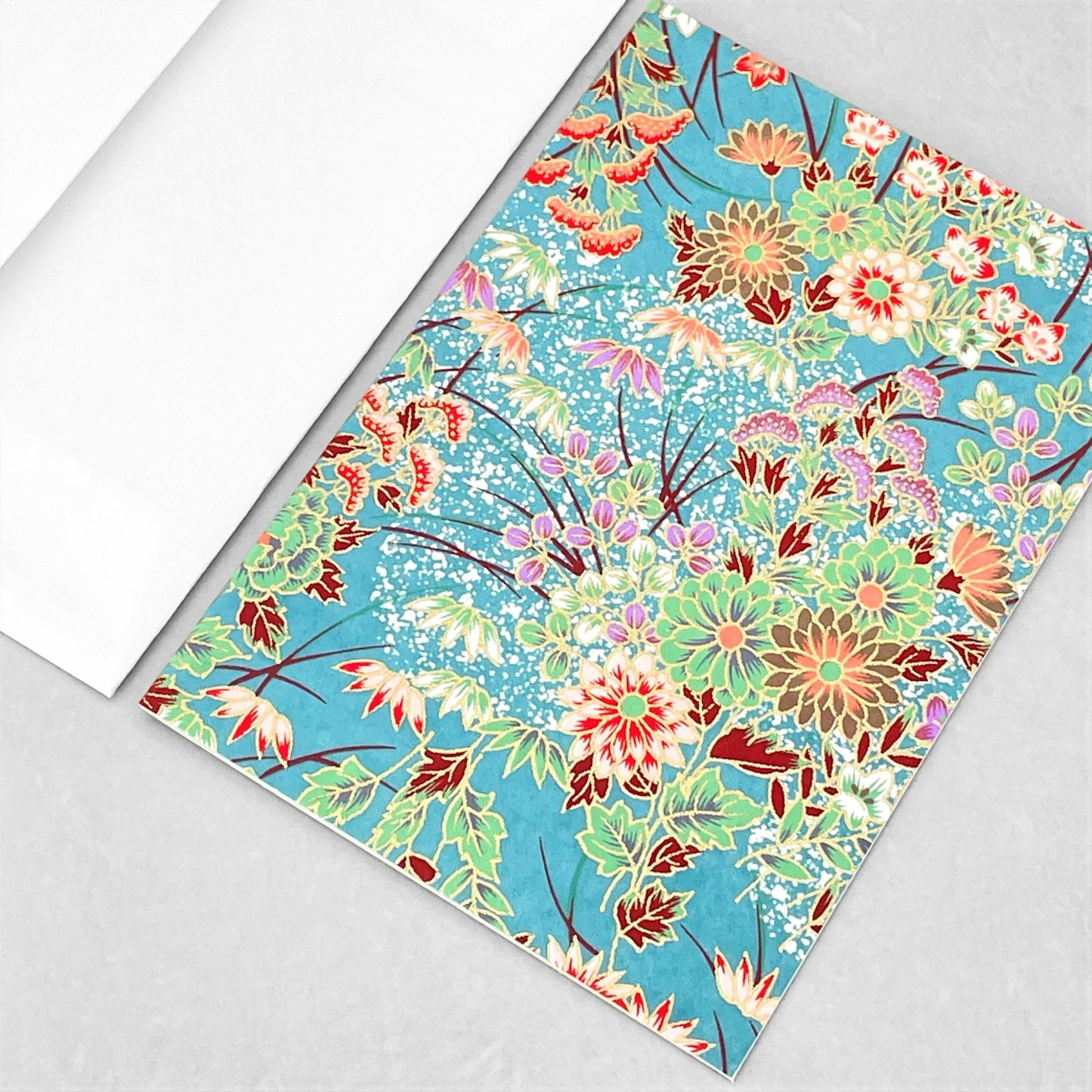 japanese silk-screen printed greetings card with a multi-colour bouquet of flowers pattern on a teal backdrop by Esmie
