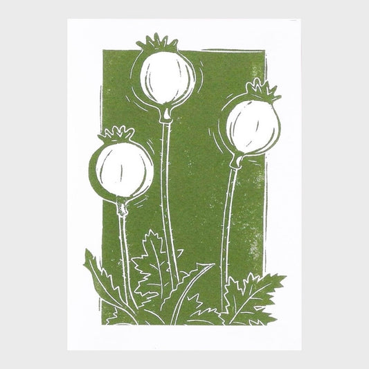 Card with white seed head design on a green background