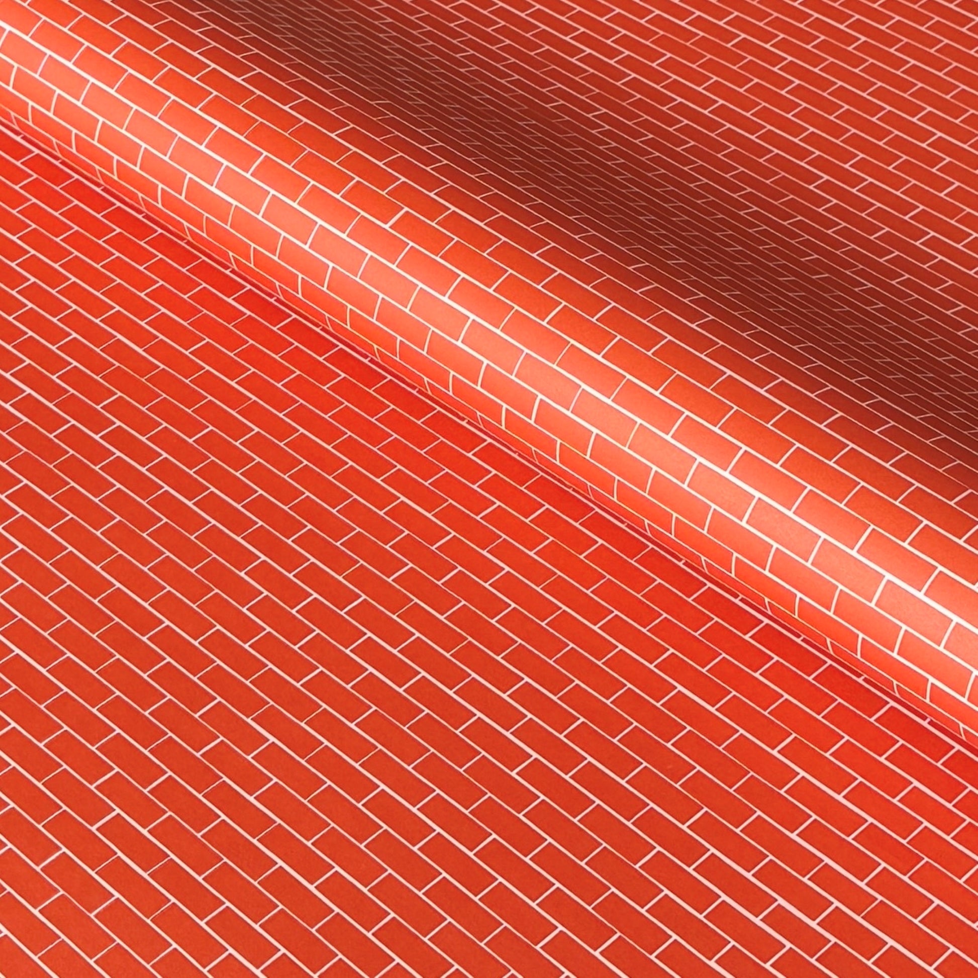a sheet of gift wrap with a small brick design in rich red and pink