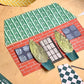 a collage of a house made with patterned gift wrap