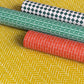 four designs of wrapping paper inspired by model making papers.  The designs are bricks, green roof tiles, parquet flooring and quarry tile chequerboard floor