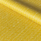 a sheet of wrapping paper with a parquet floor design in mustard and white