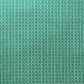 a sheet of wrapping paper with a pattern of green roof tiles