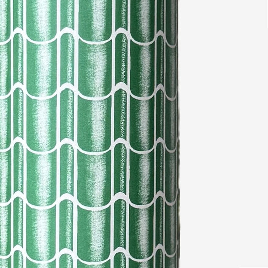 a sheet of wrapping paper with a pattern of green roof tiles