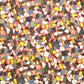Colorful terrazzo pattern on a red background. A sheet of wrapping paper.