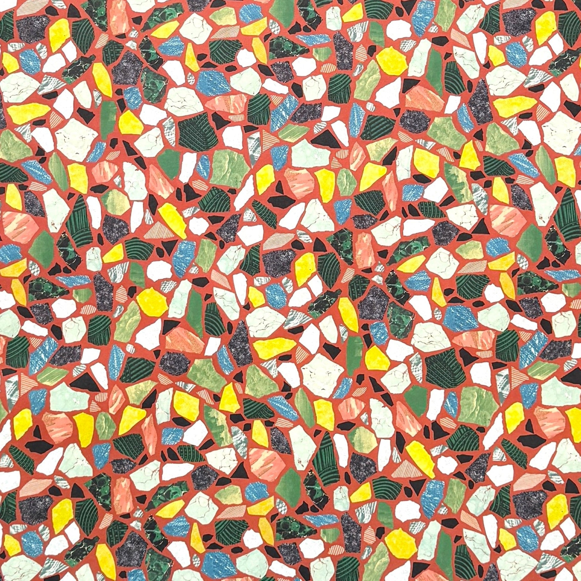 Colorful terrazzo pattern on a red background. A sheet of wrapping paper.
