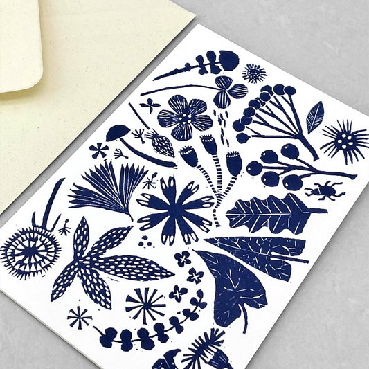greetings card with image of cut-out dark blue flowers and seed heads by Hadley Paper goods