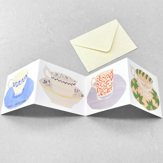 concertina card with four cups and saucers on four separate folds, by Hadley Paper Goods