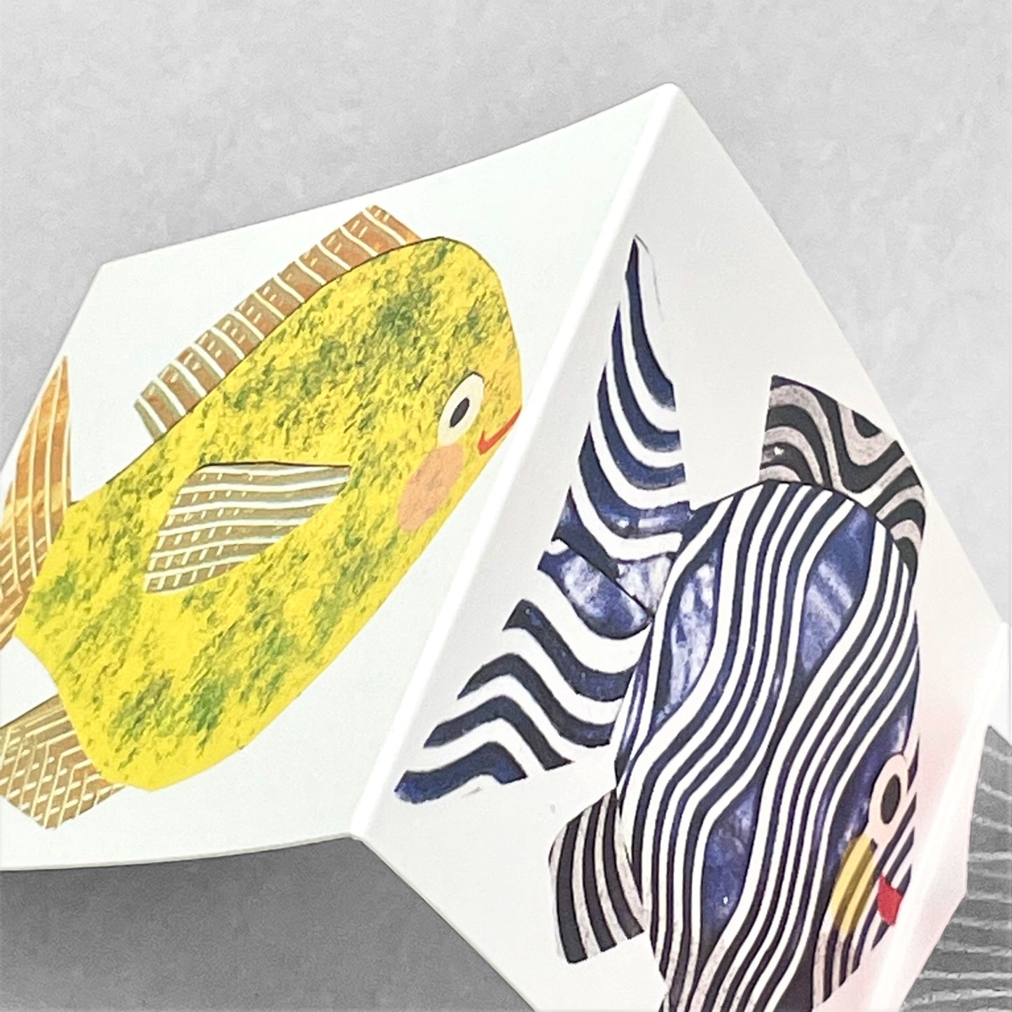 concertina greetings card of four colourful fish on four folds, by Hadley Paper Goods