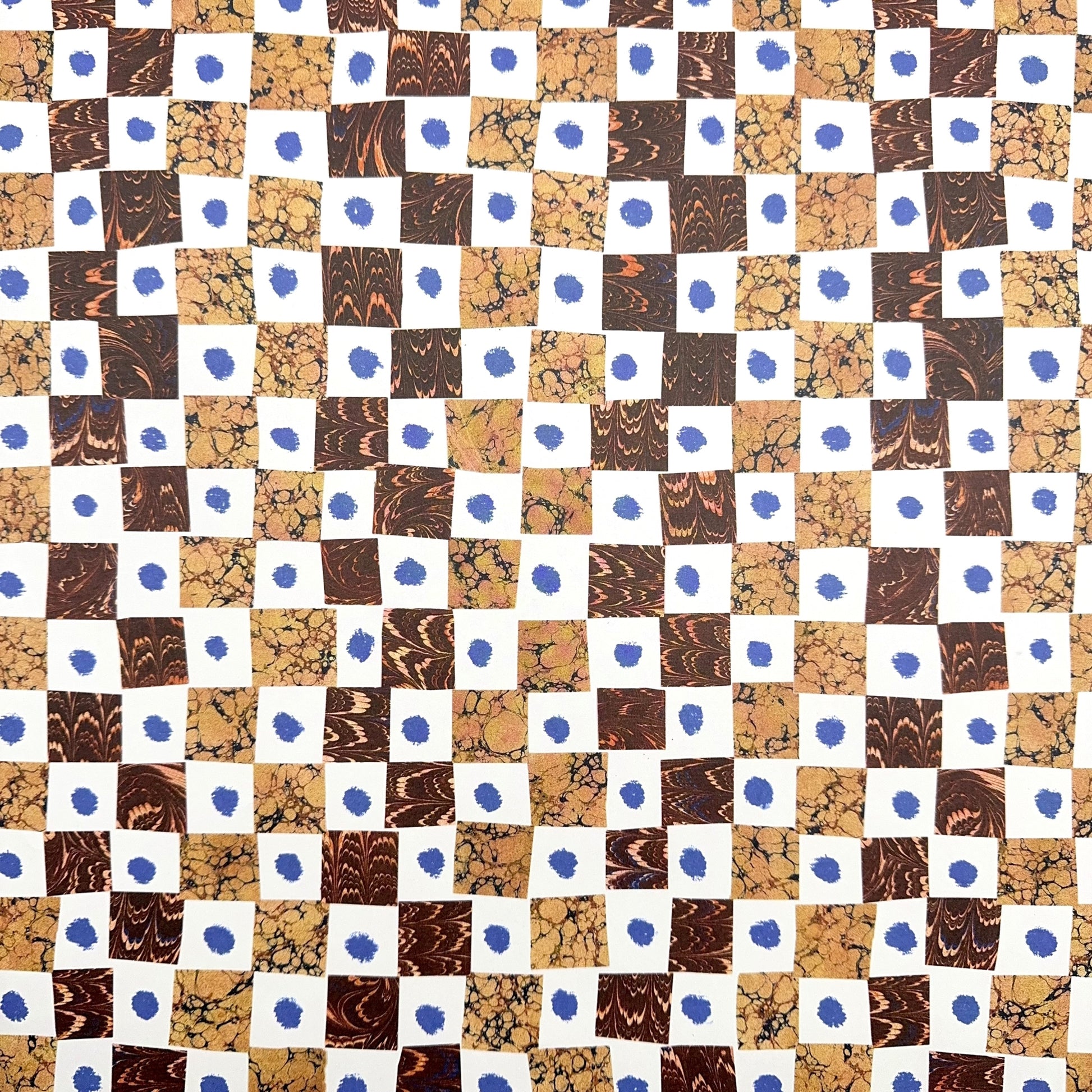 A sheet of wrapping paper by Hadley Paper Goods with a chequerboard pattern of brown marbled squares on a white background with a blue dot.