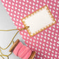 White rectangular gift tag with dark yellow star pattern border and yellow cord by Heather Evelyn