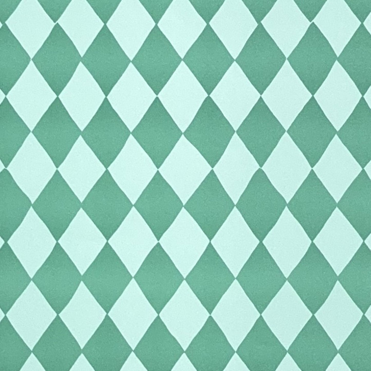 a sheet of wrapping paper with a two tone green large diamond pattern. By Heather Evelyn 
