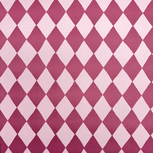 wrapping paper with large diamond design in mauve and pink.