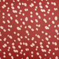 burgundy rouge wrapping paper with random blush pink spots, by Heather Evelyn. 