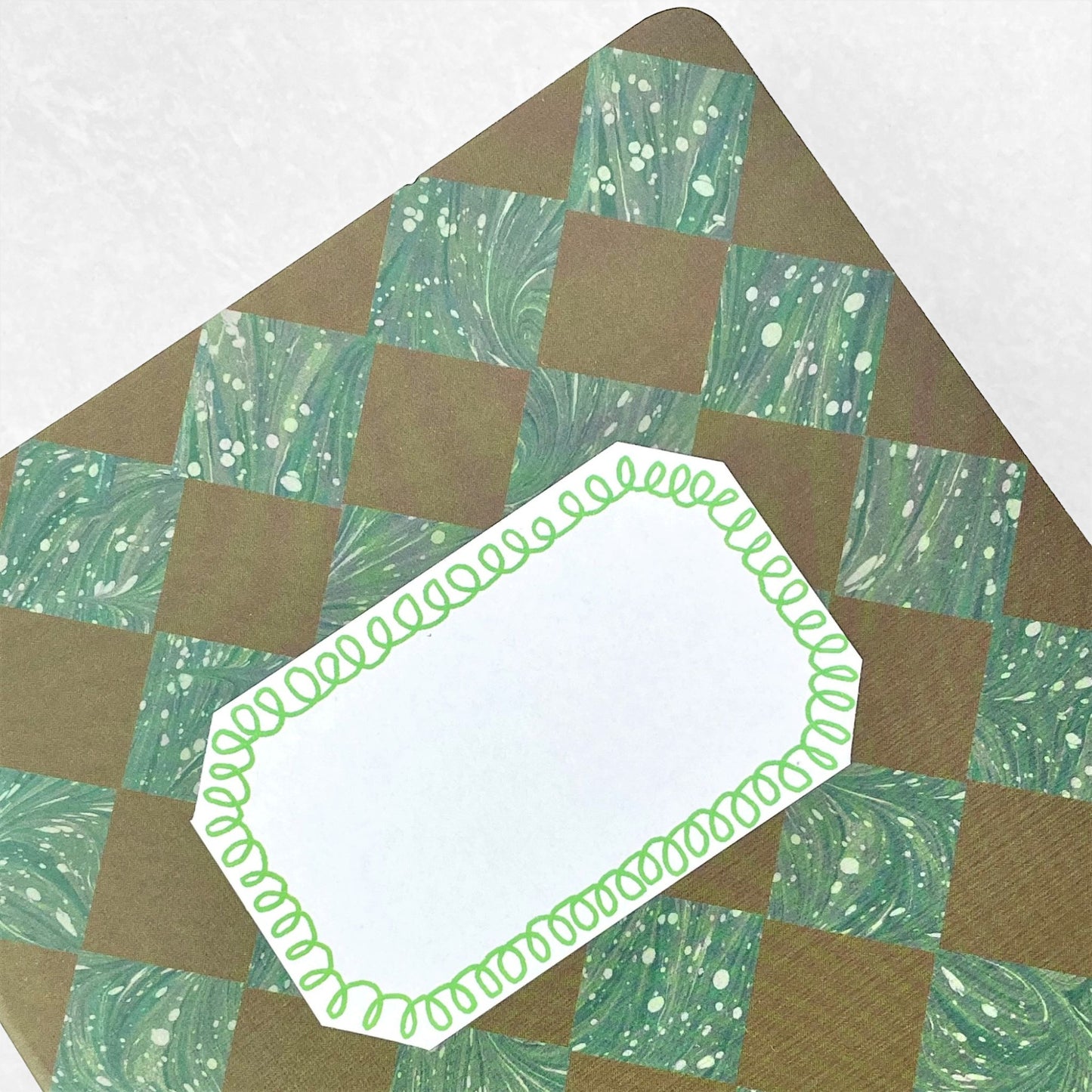 box of 50 white labels with a loopy border in green, by Hadley Paper Goods