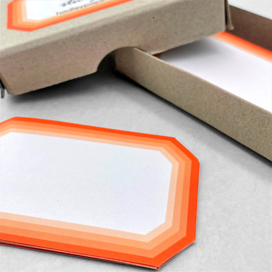box of 50 white labels with orange border, by Hadley Paper Goods