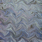 printed marbled wrapping paper by Jemma Lewis with a marbled pattern in blue and purple