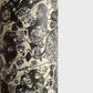 sheet of printed marbled wrapping paper by Jemma Lewis, stone effect in taupe, black and beige. Close up