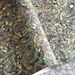 printed marble design wrapping paper by Jemma Lewis. Swirl design in inky greys and lichen greens