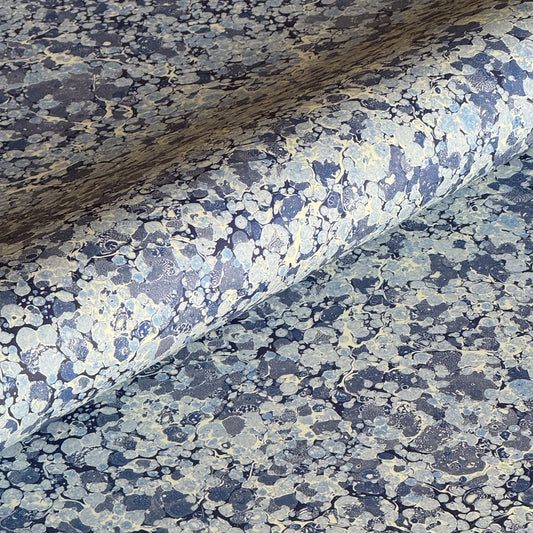 Printed marbled wrapping paper by Jemma Lewis Marbling. Marbled paper in blue and white