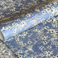 printed marble design wrapping paper by Jemma Lewis.  Daisy flower design in white and black on blue backdrop