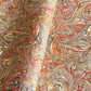 printed marbled design wrapping paper by jemma lewis.  marbled stone design in red, yellow and grey