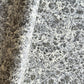 sheet of printed marbled wrapping paper by Jemma Lewis, stone effect in taupe, black and beige. 