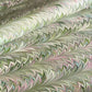 printed marbled design wrapping paper by Jemma Lewis, a feathered marble in green and lilac 