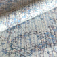 sheet of printed marbled wrapping paper by Jemma Lewis, stone effect in tones of pale blue