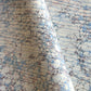 sheet of printed marbled wrapping paper by Jemma Lewis, stone effect in tones of pale blue