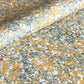 Printed marbled wrapping paper by Jemma Lewis Marbling. Marbled paper in soft greens, teal and yellow