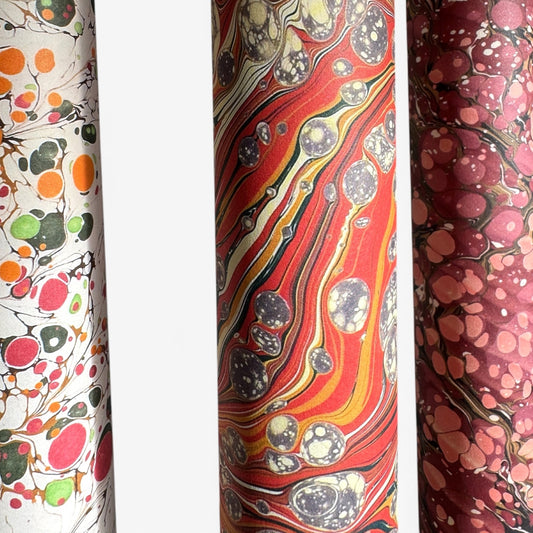 printed marbled design wrapping paper by jemma lewis.  marbled stone design in red, yellow and grey