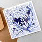 greetings card of a dark blue bird in a bush with berries by John Austin Publishing