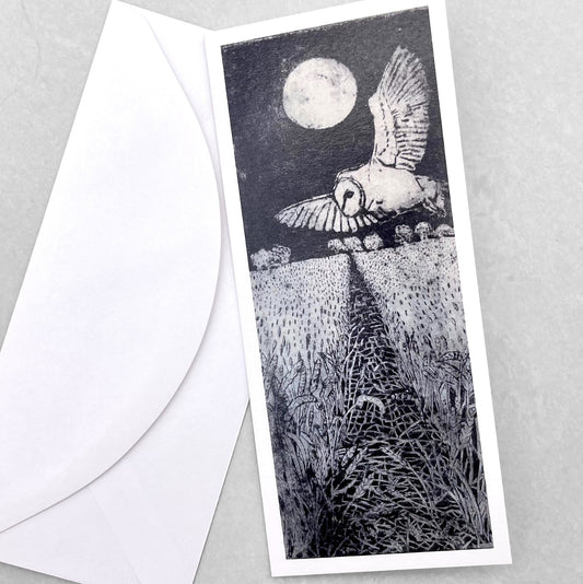 greetings card in black and white of an owl in flight with full moon in the sky by John Austin Publishing