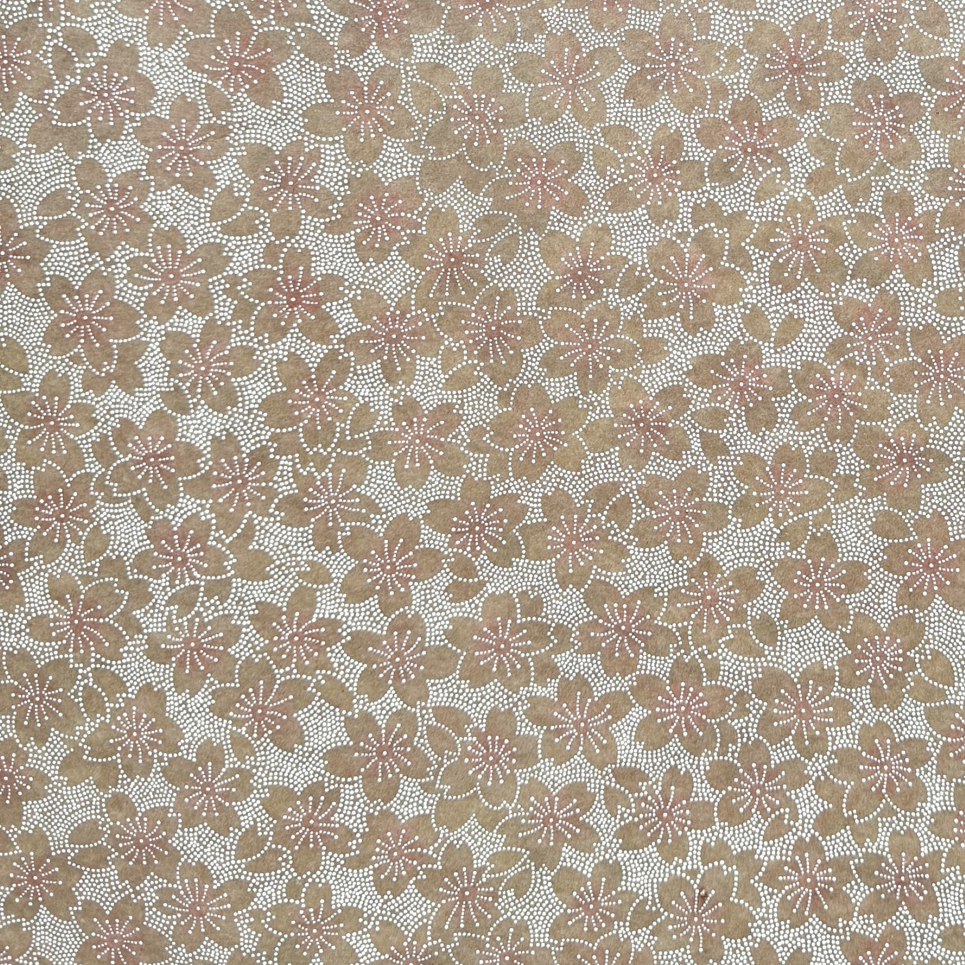 Japanese silkscreen chiyogami paper with a repeat pattern of cherry blossom flowers in taupe and white