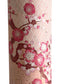 Diagonal branches of pink plum (ume) blossom on a light pink background with gold accents. Japanese chiyogami paper