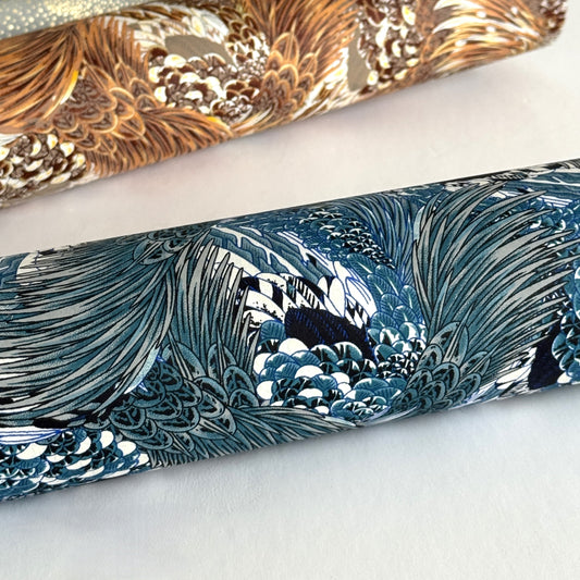 Detailed pattern of the plumage of feathers in tones of blue. Japanese chiyogami paper