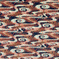 a sheet of Japanese chiyogami paper with a pattern of swirling streams with red and gold falling leaves, dark blue background