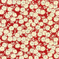 a sheet of chiyogami paper with a modern design of plum blossom in red and cream