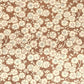 a sheet of Japanese chiyogami paper with a modern interpretation of plum blossom in taupe and cream