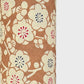 a sheet of Japanese chiyogami paper with a modern interpretation of plum blossom in taupe and cream