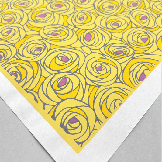 japanese silk-screen handmade paper, chiyogami, showing yellow and lilac abstract floral pattern