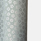 a sheet of chiyogami paper with light grey background and little silver stylised cherry blossom flowers in silver 