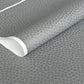 a sheet of chiyogami paper with light grey background and little silver stylised cherry blossom flowers in silver 