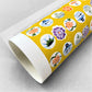 japanese silk-screen handmade paper showing circles of traditional motifs on yellow backdrop